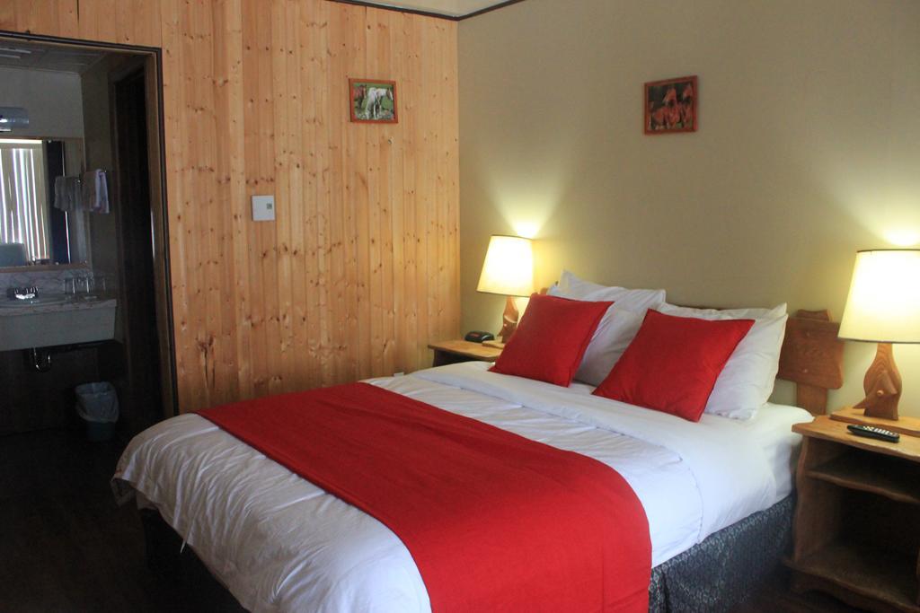 Motel Des Pays D'En Haut Val-David Rom bilde